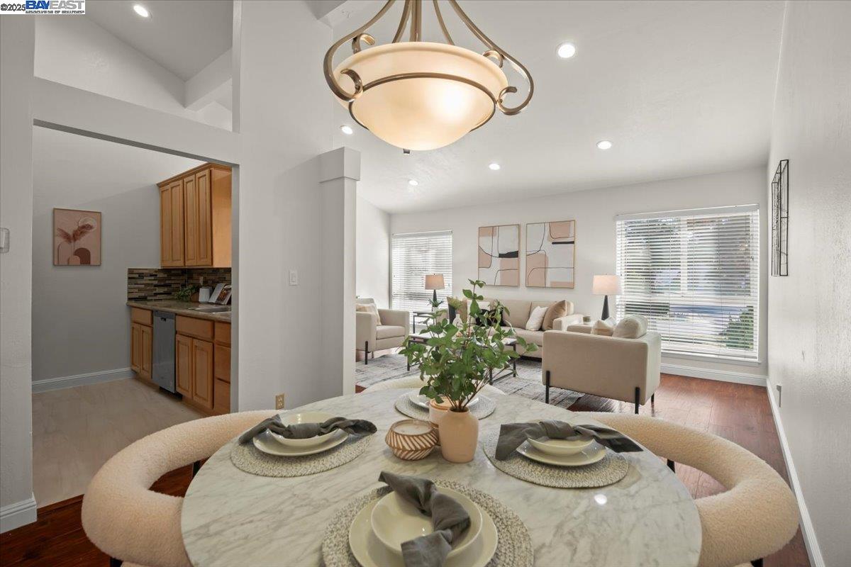 2253 Kalenda Common Fremont, CA 94539 - Photo 19 of 38 a kitchen with a table and chairs in it