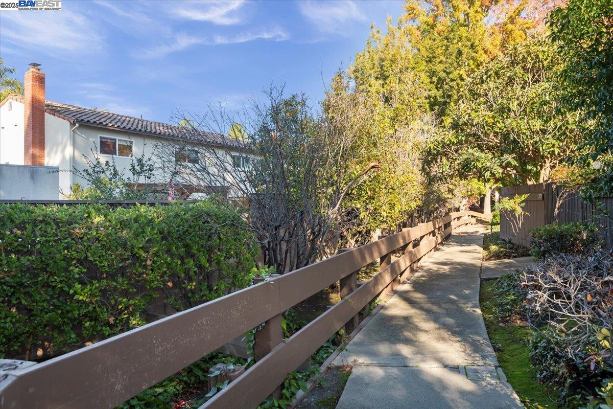 2253 Kalenda Common Fremont, CA 94539 - Photo 29 of 38 a view of a pathway both side of house next to a yard