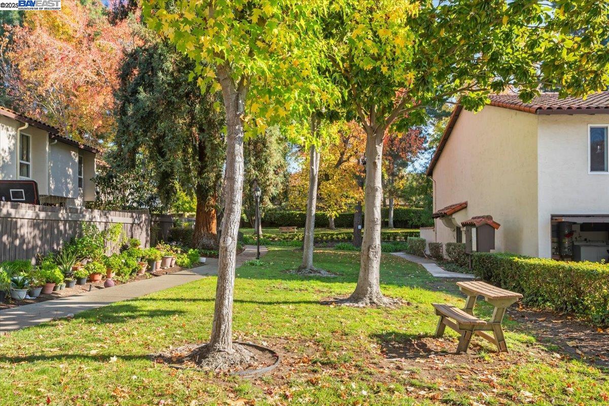 2253 Kalenda Common Fremont, CA 94539 - Photo 30 of 38 a view of a house with backyard and sitting area