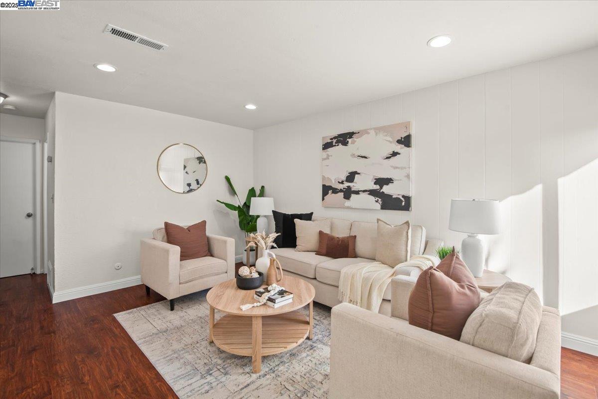 2253 Kalenda Common Fremont, CA 94539 - Photo 6 of 38 a living room with furniture and wooden floor