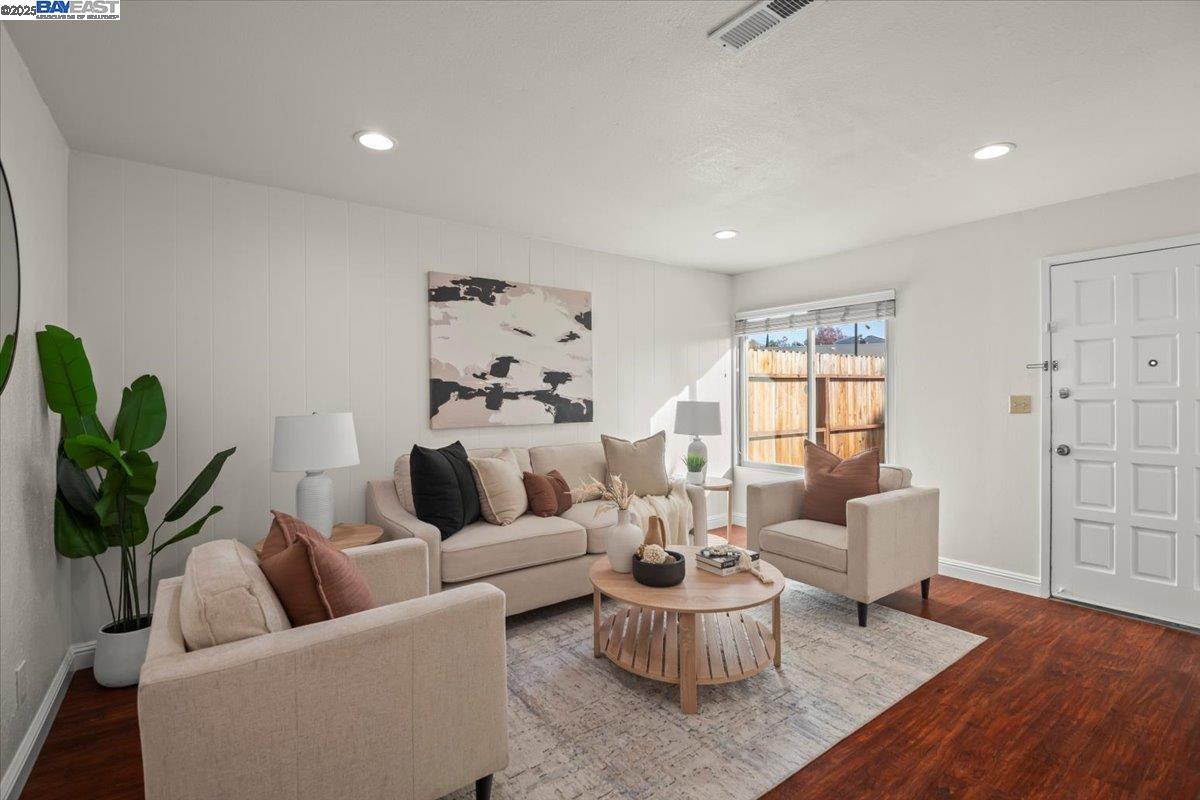 2253 Kalenda Common Fremont, CA 94539 - Photo 7 of 38 a living room with furniture and a potted plant