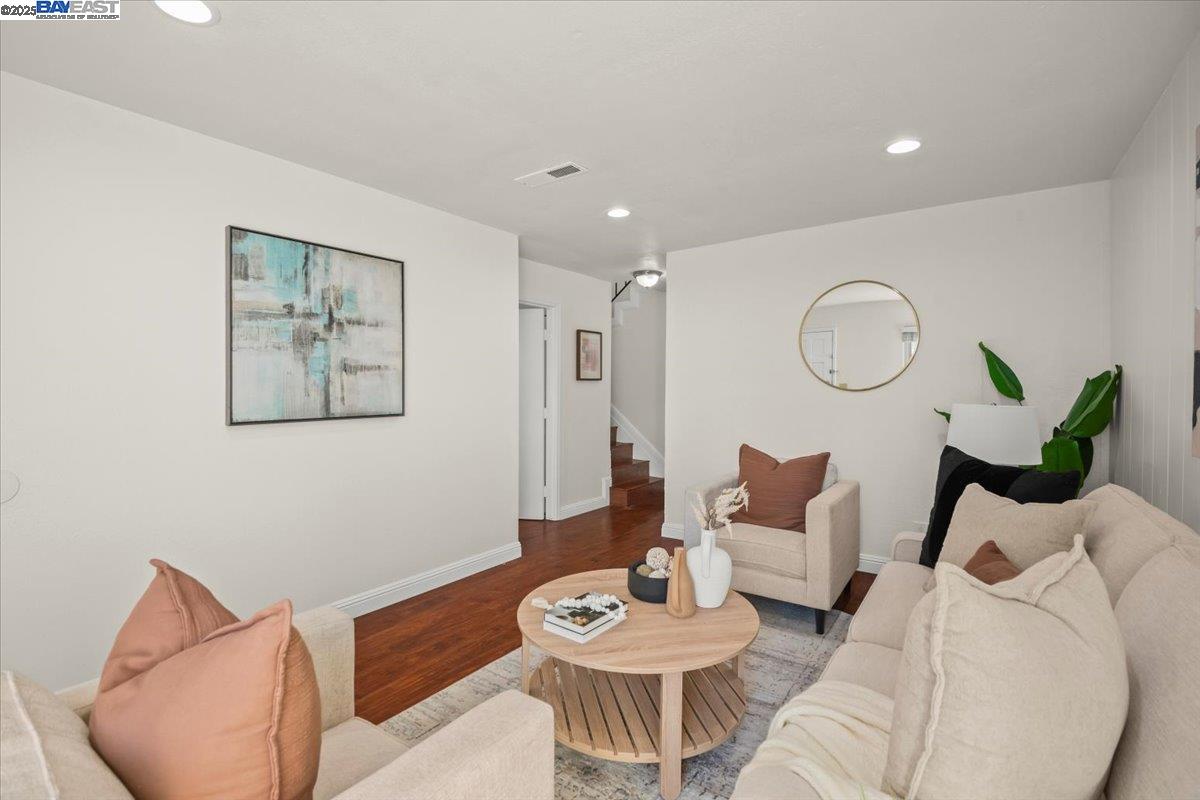 2253 Kalenda Common Fremont, CA 94539 - Photo 8 of 38 a living room with furniture and wooden floor