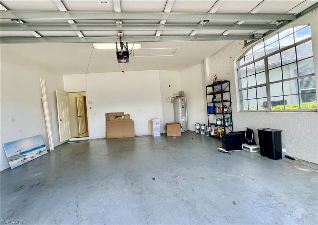 443 Crossfield Circle, Unit 74 Naples, FL 34104 - Photo 43 of 45 a view of a garage