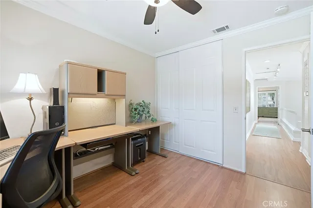 a room with furniture and wooden floor