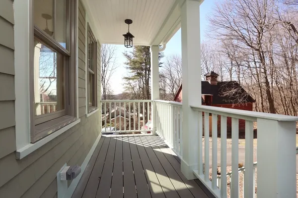 a view of balcony with furniture