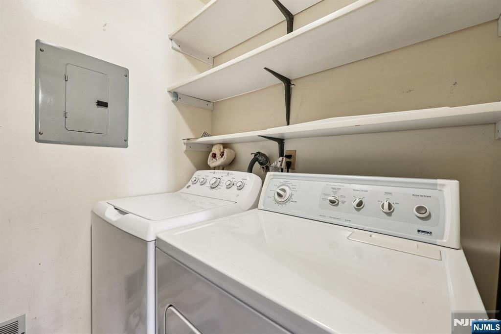 825 Riverside Avenue, Unit 207 Lyndhurst, NJ 07071 - Photo 10 of 18 a utility room with dryer and washer
