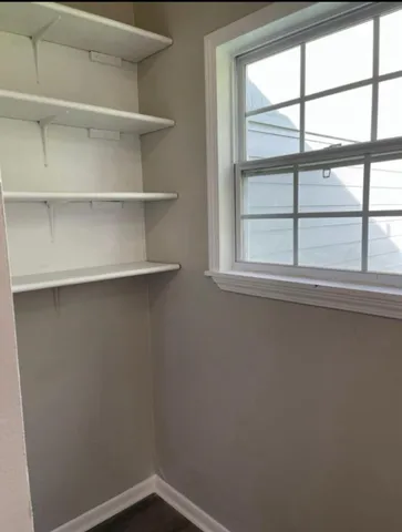 a view of a room with rack on the wall