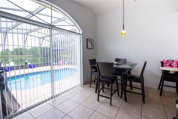 a kitchen with stainless steel appliances a refrigerator and a stove top oven