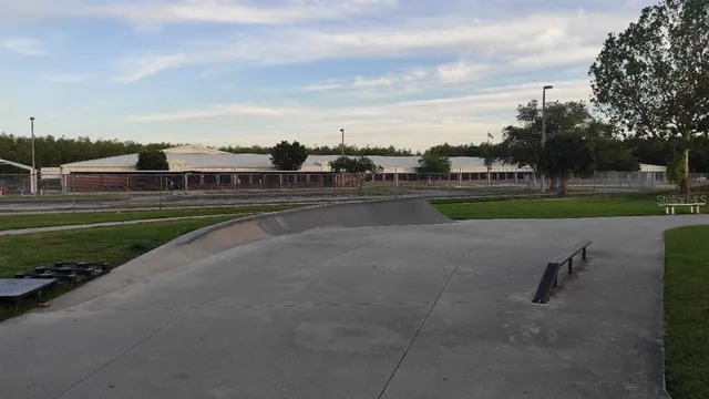 a view of a backyard with a garden and plants