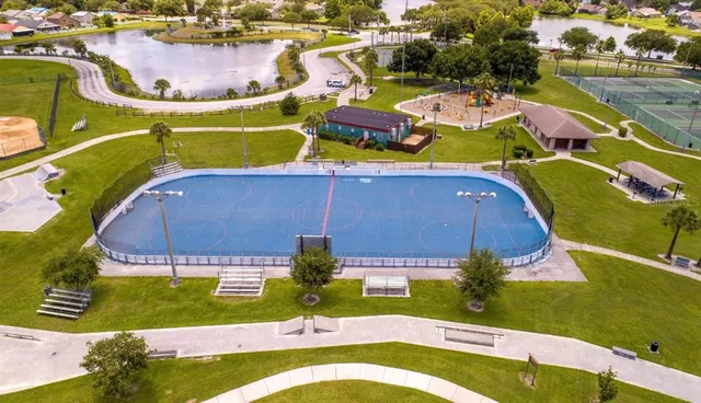 a view of a swimming pool with a patio