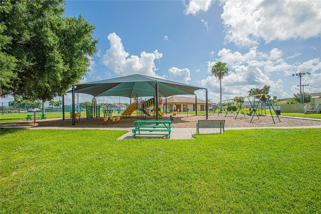 1832 Wimbledon Street Kissimmee, FL 34743 - Photo 38 of 39 a view of pool with lawn chairs and couches