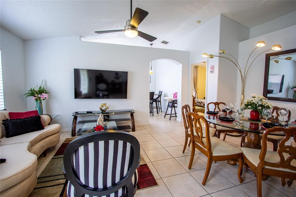1832 Wimbledon Street Kissimmee, FL 34743 - Photo 7 of 39 a view of a livingroom and dining room