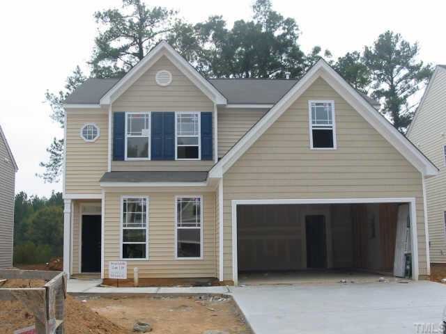 3536 Sunbright Lane Raleigh, NC 27610 - Photo 1 of 1 a front view of a house with a garage