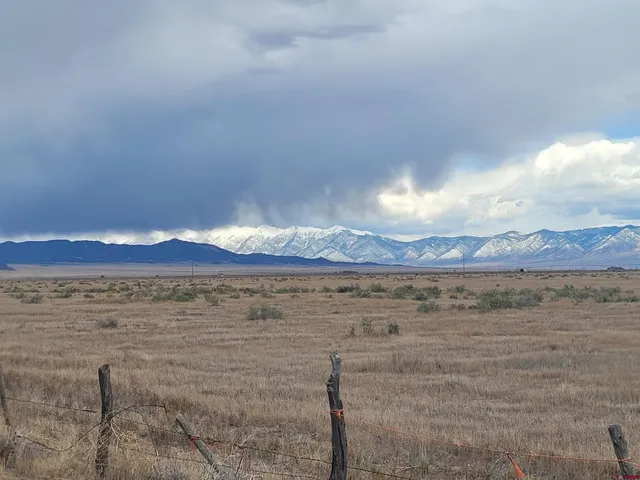 a view of a lake in middle of the town