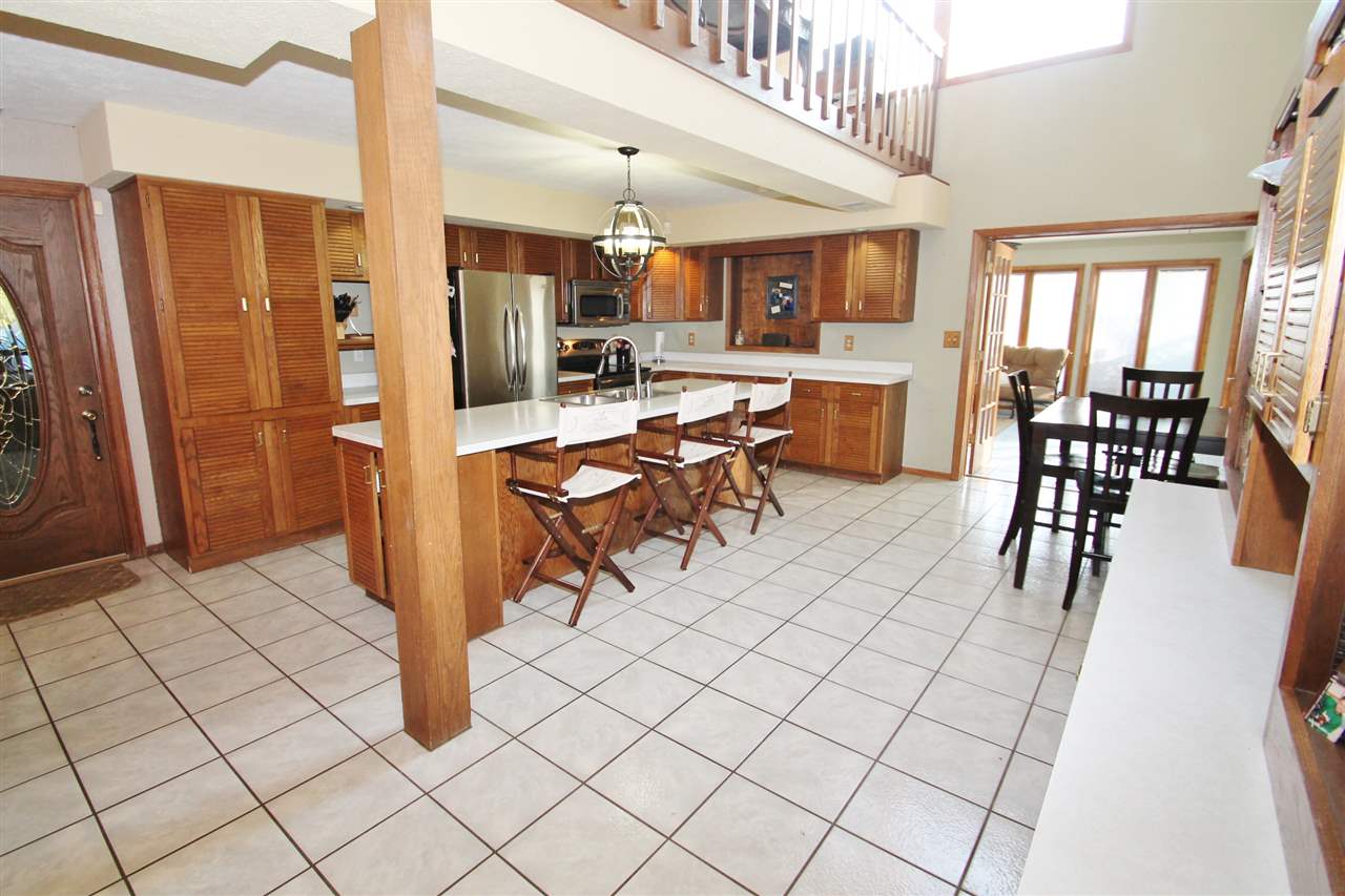 8212 Snaresbrook Road Roscoe, IL 61073 - Photo 5 of 25 a view of a dining room with furniture