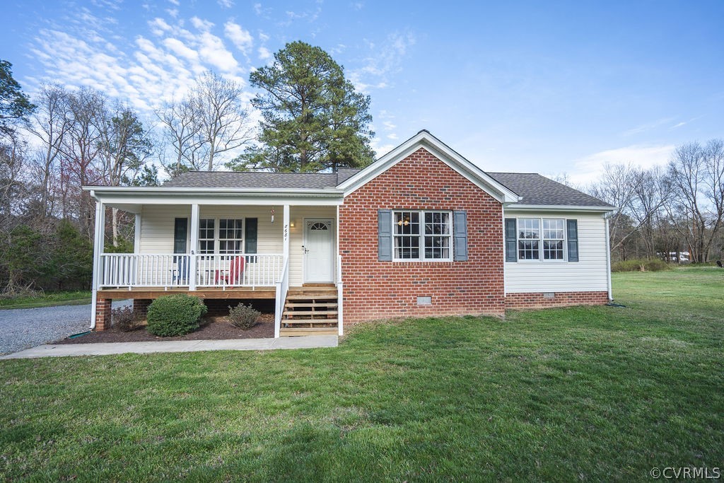 8681 Strath Road Henrico, VA 23231 - Photo 1 of 29 a front view of a house with a yard