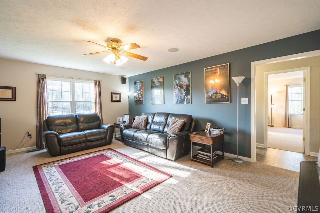 8681 Strath Road Henrico, VA 23231 - Photo 12 of 29 a living room with furniture and a rug