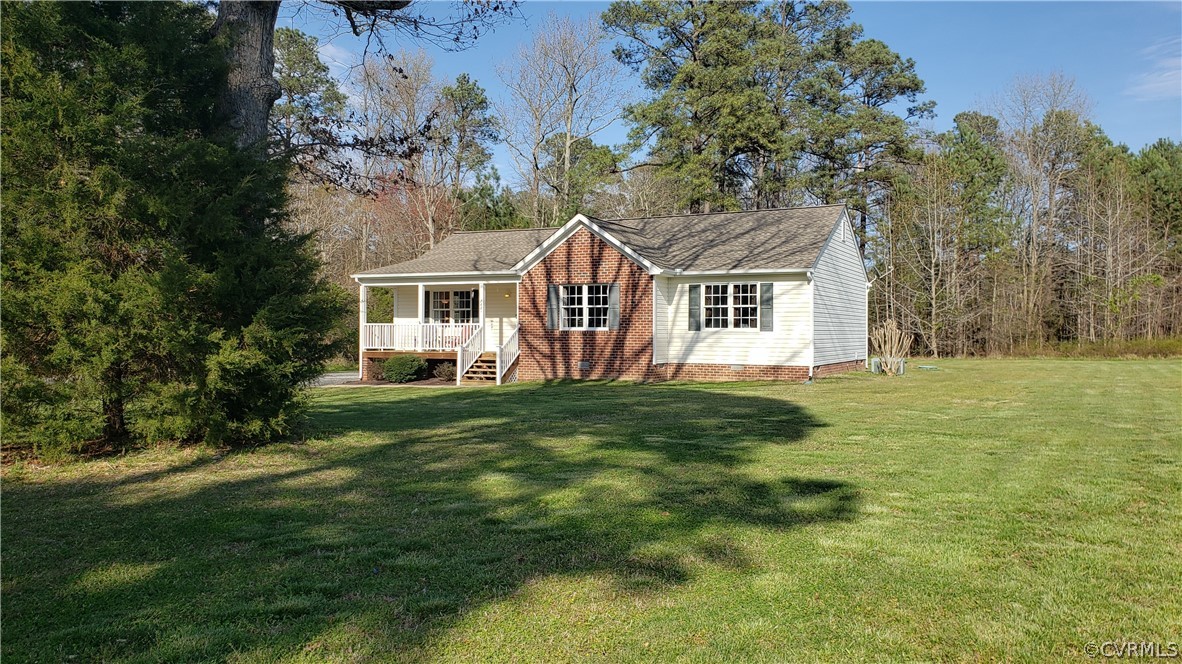 8681 Strath Road Henrico, VA 23231 - Photo 2 of 29 a view of a yard in front of house