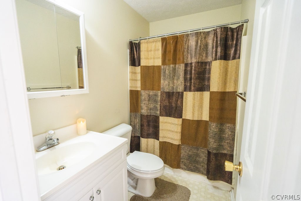 8681 Strath Road Henrico, VA 23231 - Photo 21 of 29 a bathroom with a sink and a toilet