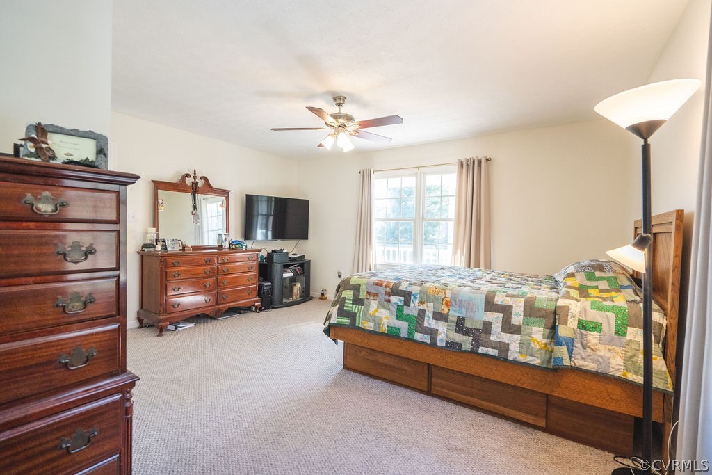 8681 Strath Road Henrico, VA 23231 - Photo 25 of 29 a bed room with furniture and a flat screen tv