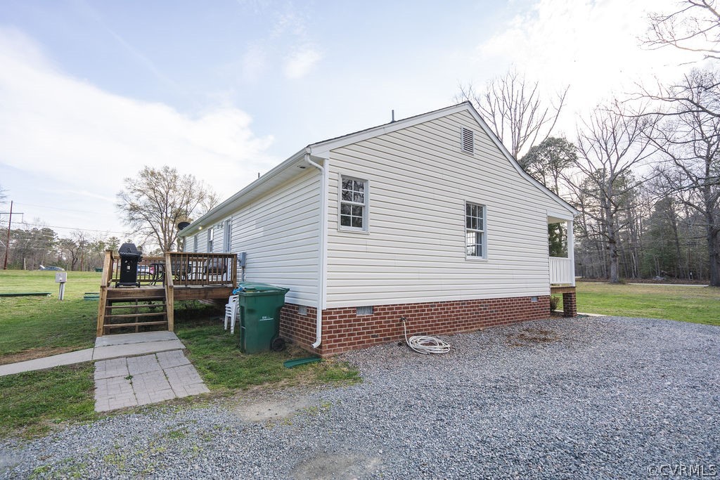 8681 Strath Road Henrico, VA 23231 - Photo 4 of 29 a view of a house with backyard