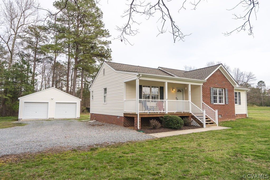 8681 Strath Road Henrico, VA 23231 - Photo 5 of 29 a view of a yard in front of a house with large trees