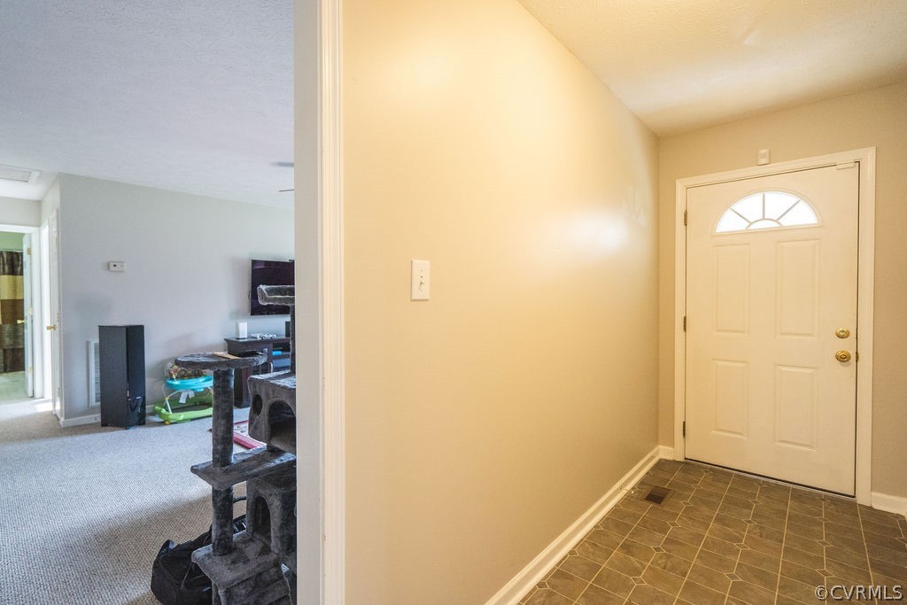 8681 Strath Road Henrico, VA 23231 - Photo 9 of 29 a view of a hallway with workspace