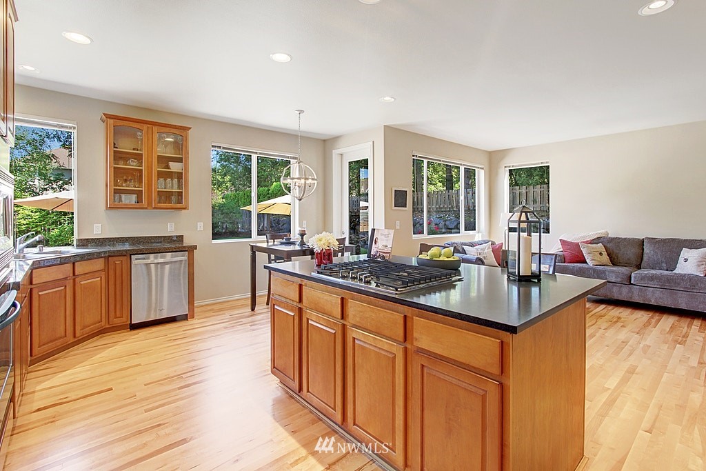 27712 Maple Ridge Way Southeast Maple Valley, WA 98038 - Photo 12 of 36 a view of a kitchen with granite countertop lots of counter top space