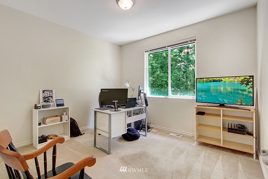 27712 Maple Ridge Way Southeast Maple Valley, WA 98038 - Photo 25 of 36 a view of a workspace with furniture and a window