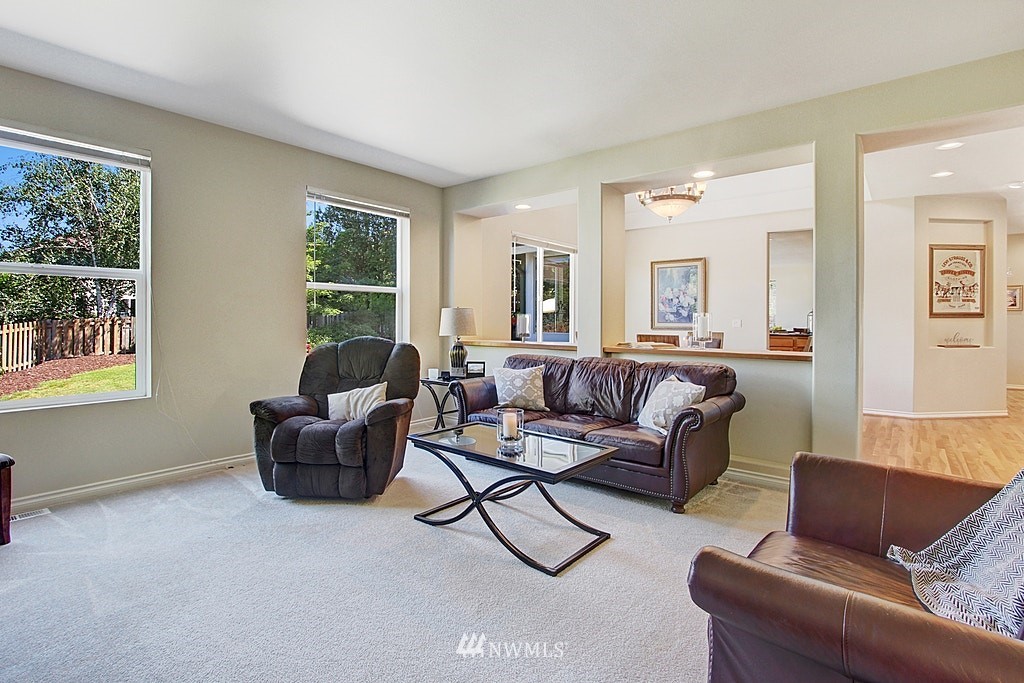 27712 Maple Ridge Way Southeast Maple Valley, WA 98038 - Photo 9 of 36 a living room with furniture and a window
