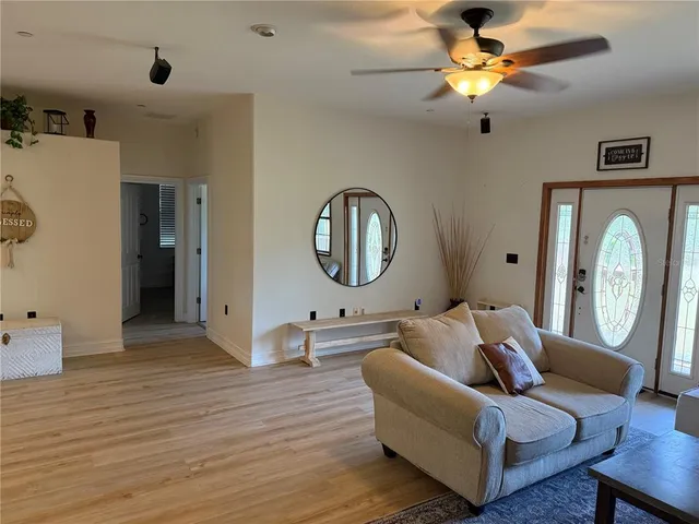a kitchen with stainless steel appliances a sink stove and cabinets