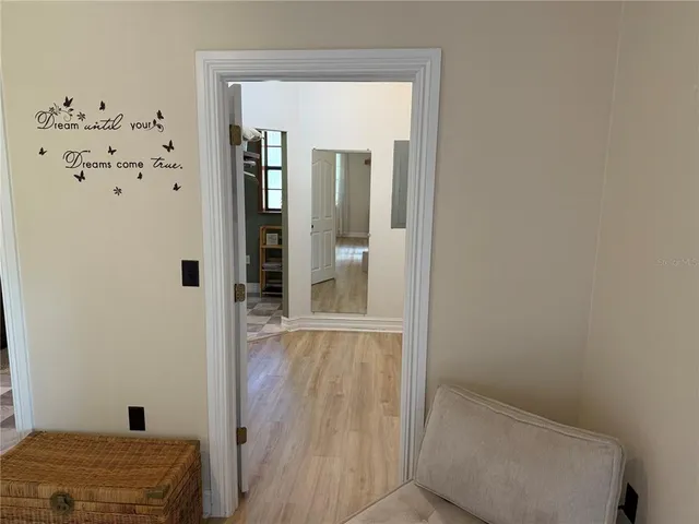 a bathroom with a sink vanity and mirror
