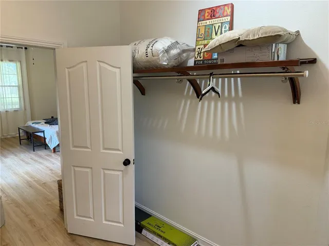 a bathroom with a bathtub a sink and a window