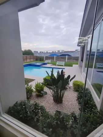 a view of a terrace with sitting area