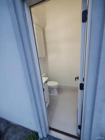 a bathroom with a sink and toilet