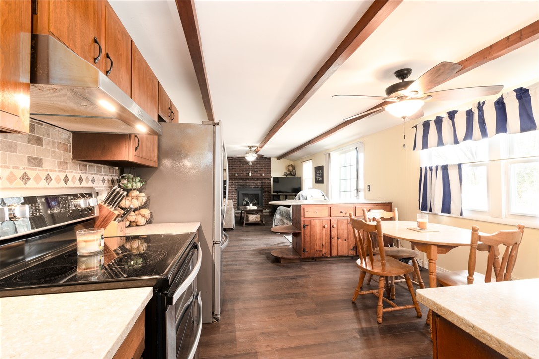208 Eileen Drive Greece, NY 14616 - Photo 5 of 15 Kitchen into Family Room from the Dining Area.