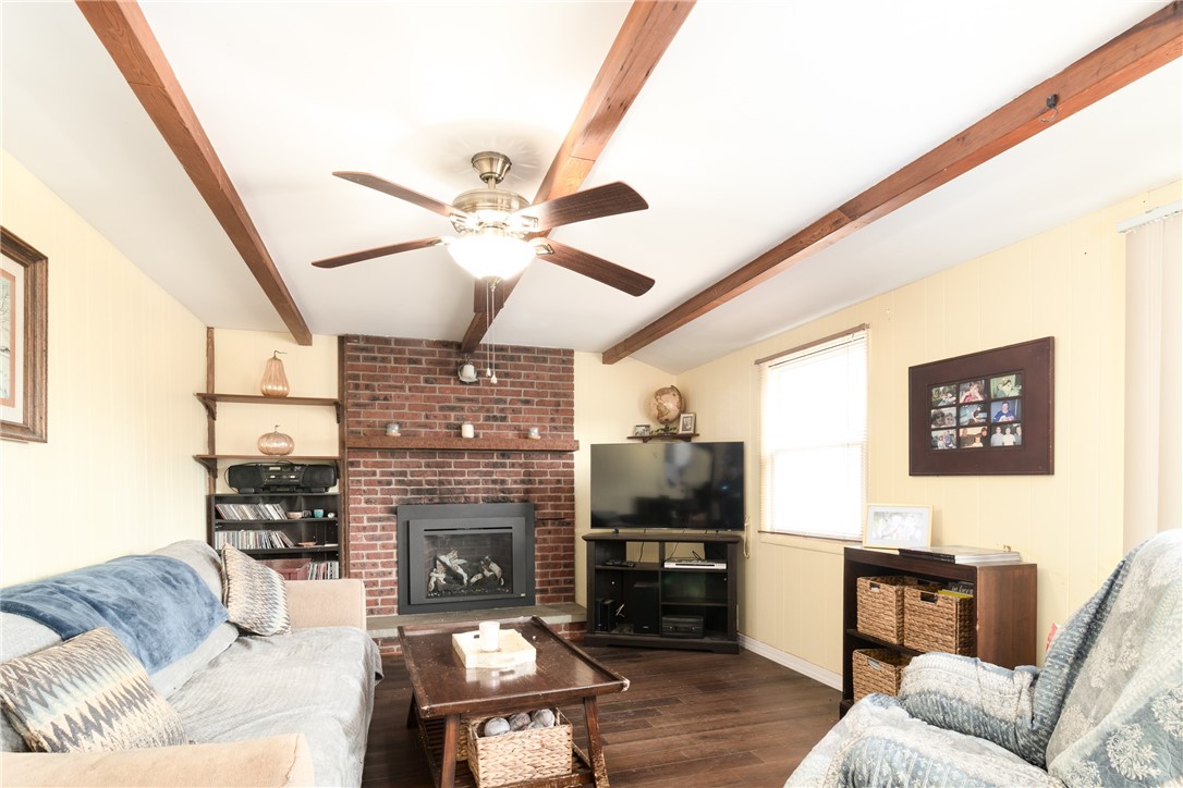 208 Eileen Drive Greece, NY 14616 - Photo 6 of 15 Family Room. New Gas Fireplace Insert. Garage & Ba