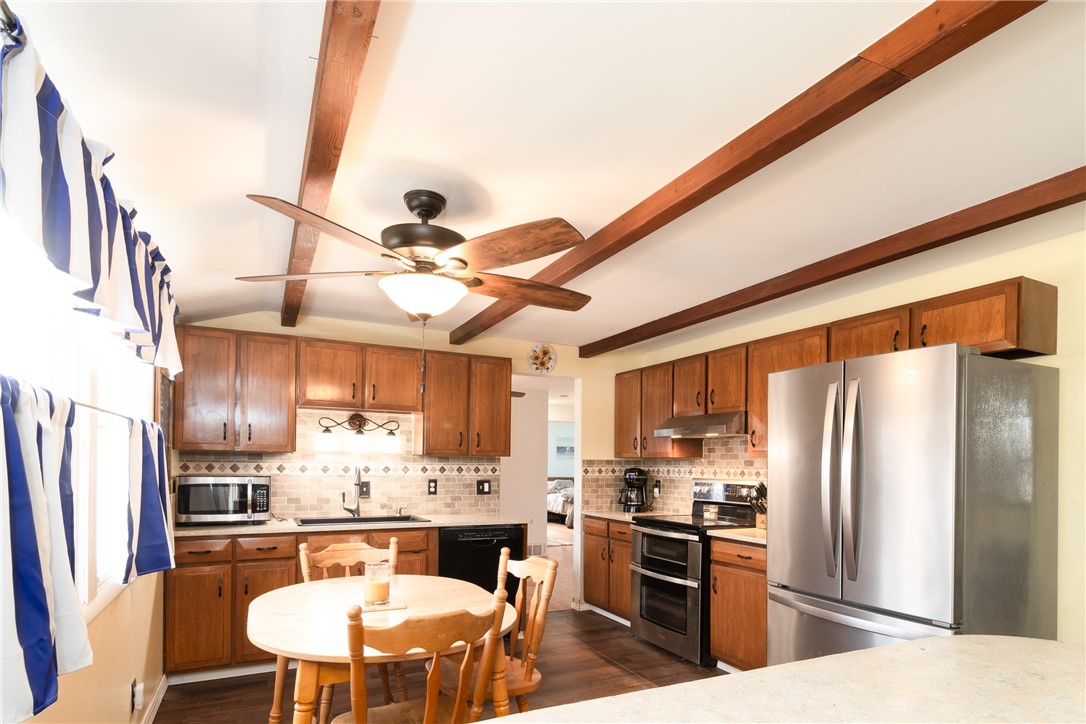 208 Eileen Drive Greece, NY 14616 - Photo 7 of 15 The Kitchen From the Family Room. Great space. New