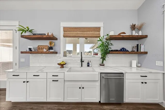 a view of a utility room with closet