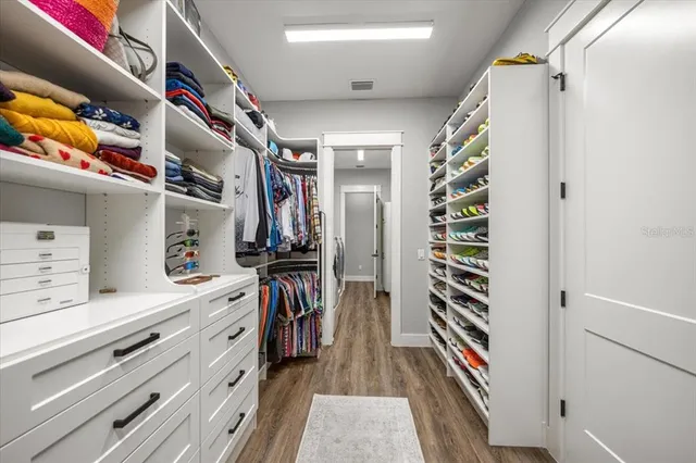 a very nice looking room with a ceiling fan