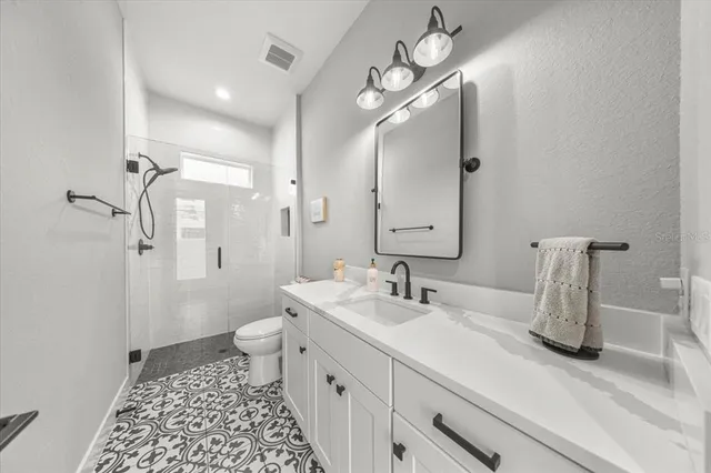 a very nice looking room with a flat screen tv