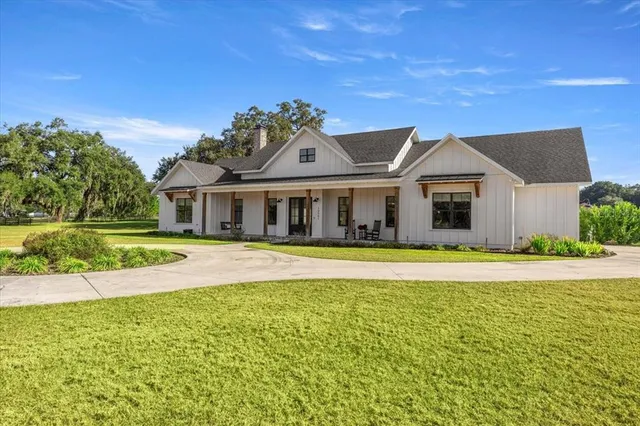 a view of a lake with a yard