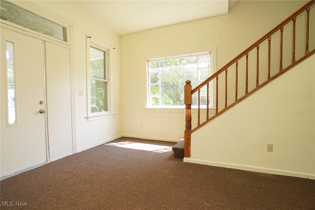 1720 Jacobs Road Youngstown, OH 44505 - Photo 14 of 18 Foyer featuring carpet and stairs