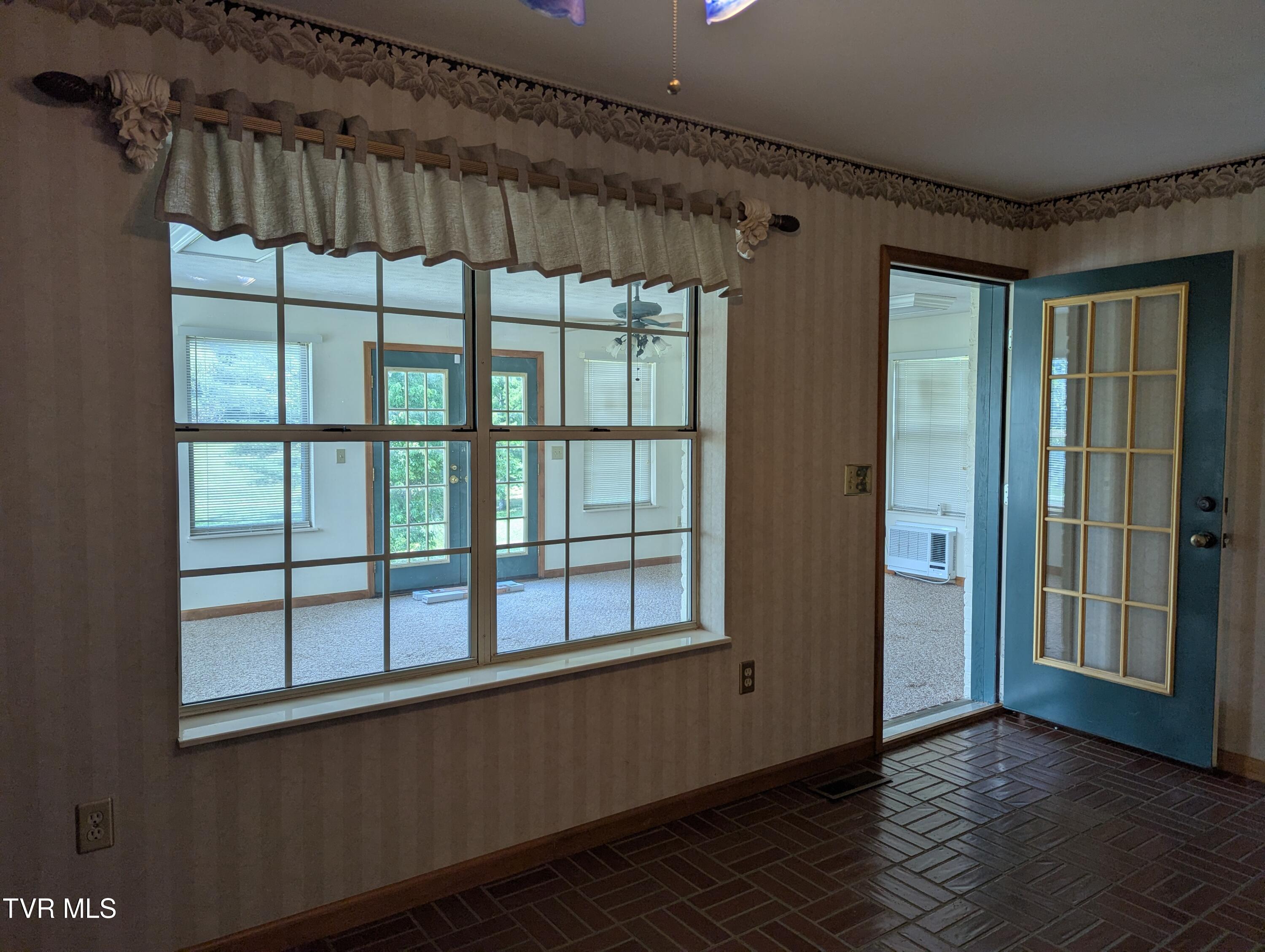 1473 Oasis Road Bulls Gap, TN 37711 - Photo 40 of 143 Dining to sunroom