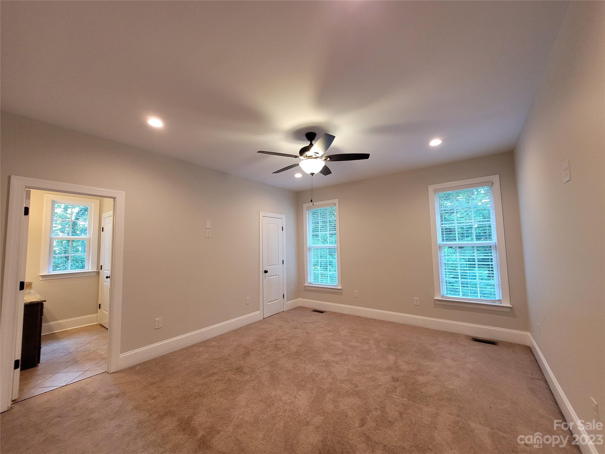 2775 Beechwood Road Denver, NC 28037 - Photo 15 of 26 a view of an empty room with a window