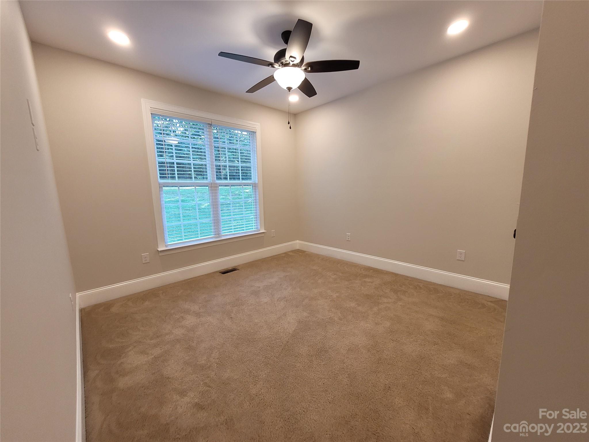 2775 Beechwood Road Denver, NC 28037 - Photo 19 of 26 an empty room with a window