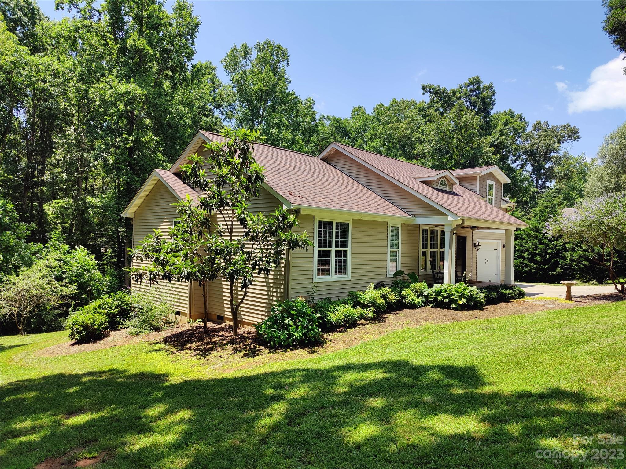 2775 Beechwood Road Denver, NC 28037 - Photo 2 of 26 a view of a house with a yard and potted plants