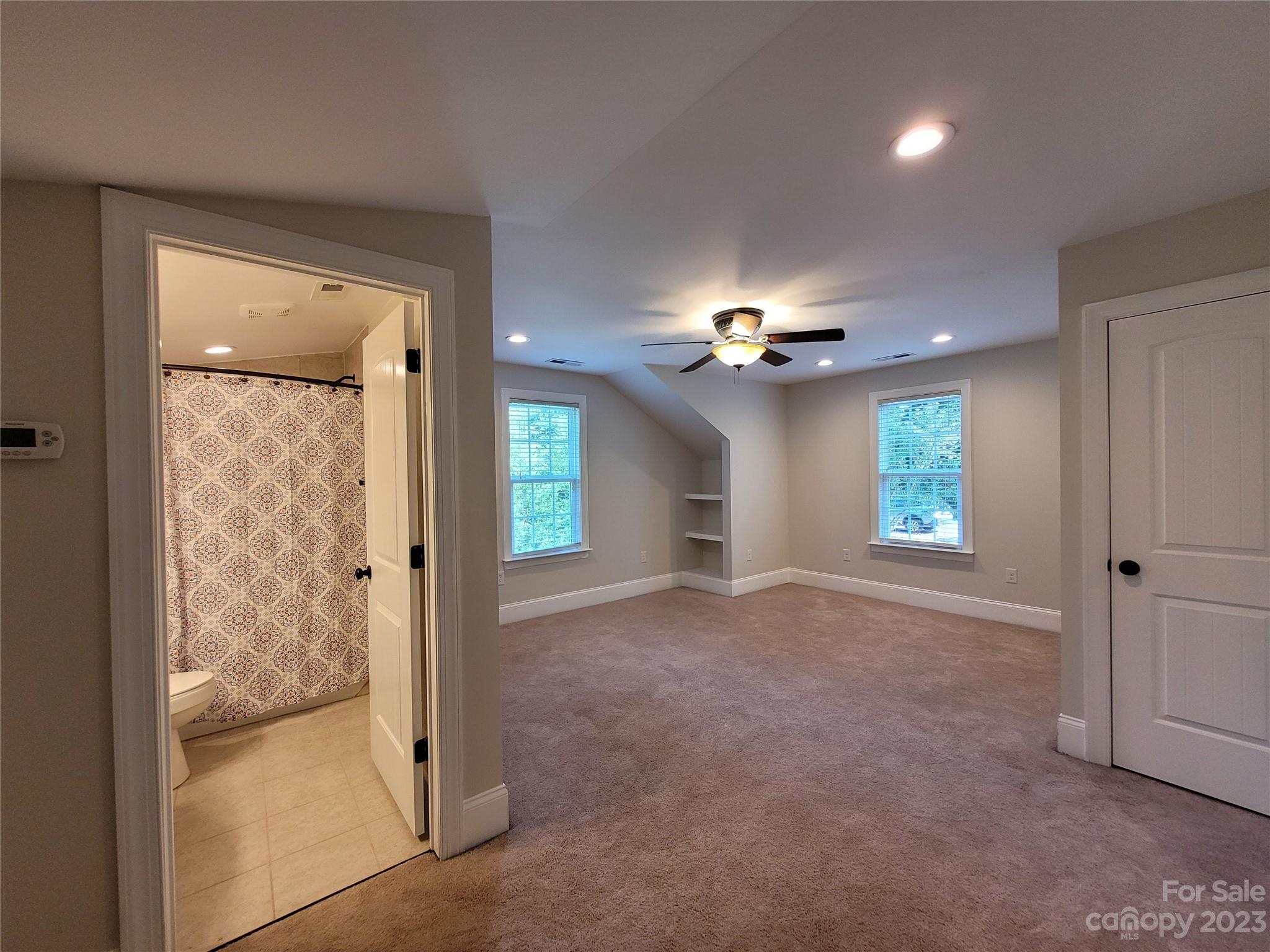 2775 Beechwood Road Denver, NC 28037 - Photo 21 of 26 wooden floor in an empty room with a window