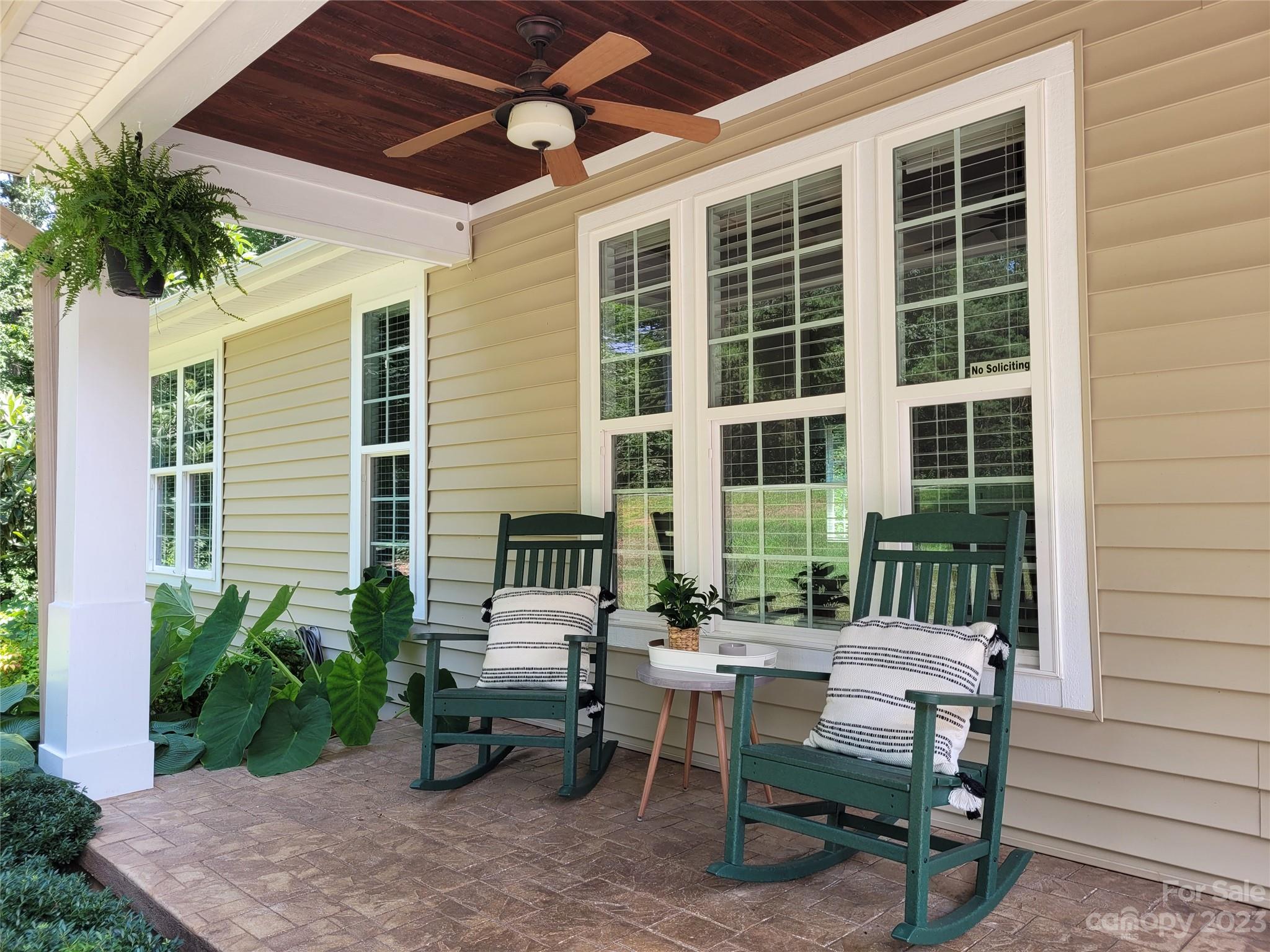 2775 Beechwood Road Denver, NC 28037 - Photo 23 of 26 a view of a patio with a table and chairs