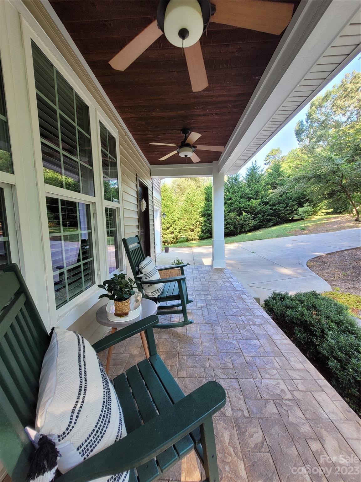 2775 Beechwood Road Denver, NC 28037 - Photo 5 of 26 a living room with furniture and a floor to ceiling window